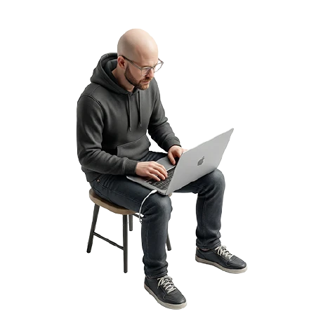 Dylan Andersen, GearDex founder, working on a laptop