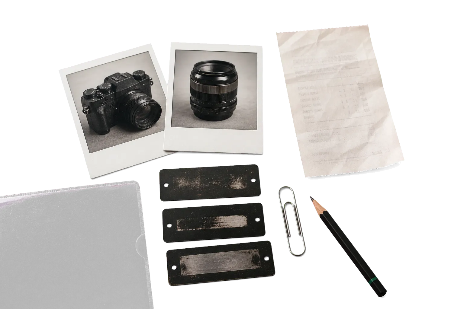 Camera evidence prints, receipt, identification plates, document sleeve, and pencil
